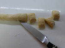 Cut the gnocchi into small pillow shaped pieces