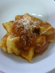 Home made gnocchi with tomato sauce and Parmesan cheese